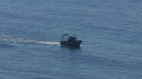 Fishing Boat Floating on the Ocean Waves Stock Footage 46515460