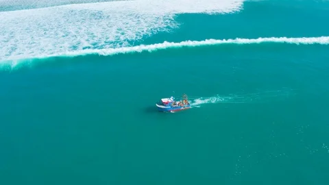 Fishing Boat Floating on Ocean Waves Near Shore Stock Footage 105197076