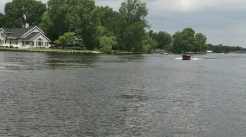 Fishing boat going fast on small river Stock Footage 40184718