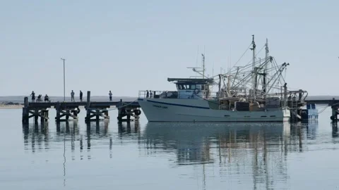 Fishing boat at jetty Stock Footage 245592884