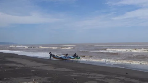 A fishing boat landed Stock Footage 149386572