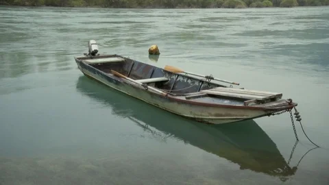 Fishing Boat located on the River 스톡 동영상 94904979