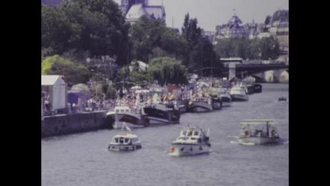 Fishing boat navigating seine river during paris port de pche event 스톡 동영상 290980392