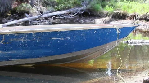 Fishing boat parked in stream Stock Footage 51713698