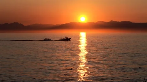 Fishing Boat Passing Across False Bay at Sunrise, South Africa. Stock Footage 340160718