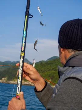 Fishing on a boat Stock Photos