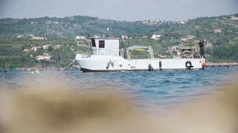 Fishing boat resting on waves in the middle of the Adriatic Sea in slow motion Vídeo Stock 84802673