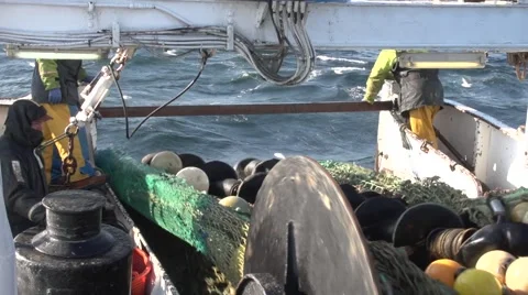 Fishing boat retrieves net Stock Footage 47324677