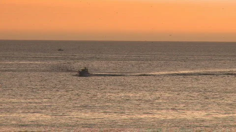 Fishing Boat return at sunset 動画素材 327660