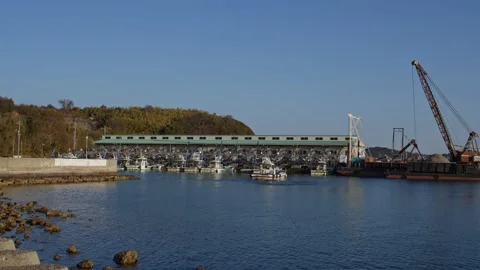 A Fishing Boat Returning to Dock. Stock Footage 235396444