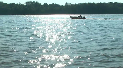 Fishing boat returns to dock in late morning Stock Footage 25571184