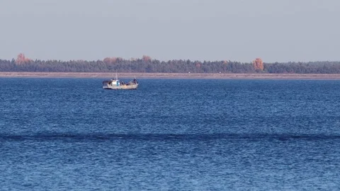 Fishing boat on the river. Video stock 164382274