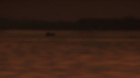 Fishing boat on river at sunset Video stock 153382