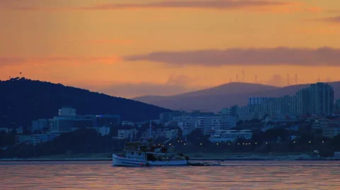Fishing boat sailing at sunset 스톡 동영상 36656923