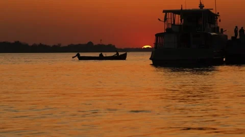 Fishing boat sails in the sunset Stock Footage 236106333