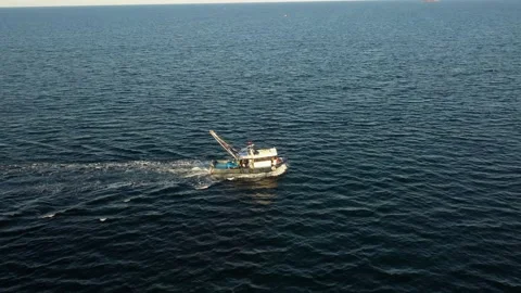 A fishing boat in the sea Stock Footage 148559122