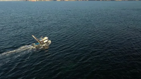 A fishing boat in the sea Stock Footage 148559248