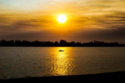 Fishing boat at sunrise 写真素材