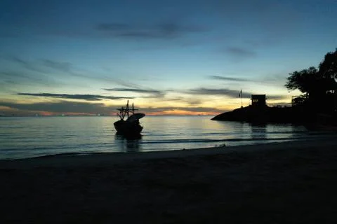 Fishing boat as the sunrises Stock Photos