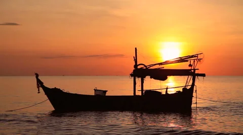 Fishing boat at sunset 動画素材 63854820