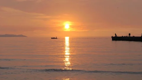 Fishing boat at sunset Stock Footage 95044036
