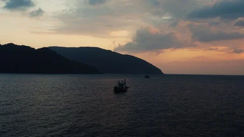 Fishing boat at sunset Stock Footage 97782077
