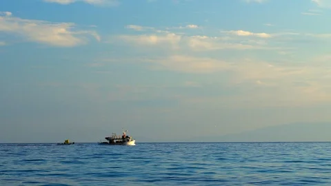 Fishing boat at sunset Stock Footage 117363816