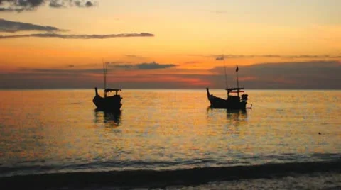 Fishing boats at the beach Stock Footage 20528644