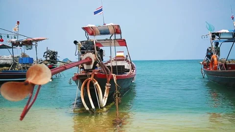 Fishing boats on the beach Stock Footage 75464684