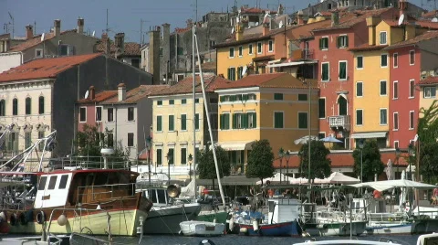 Fishing boats moored in the harbor at Rovinj Croatia. Stock Footage