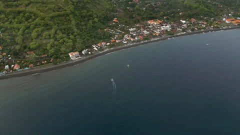 Fishing Boats Pull Into Amed Beach Village Black Sand Bali Indonesia Drone 스톡 동영상 345017337