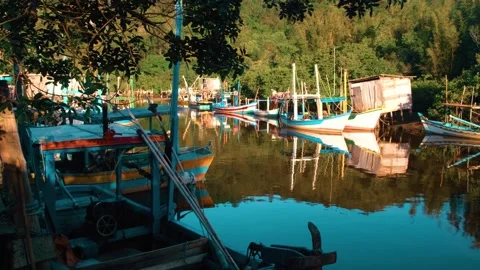 Fishing boats on the river Stock Footage 138584133