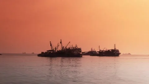 Fishing boats at sunset Stock Footage 87390564