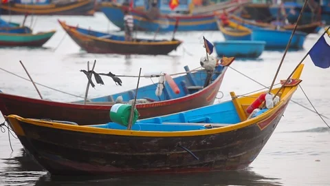 Fishing boats swing on the waves Stock Footage 112124792