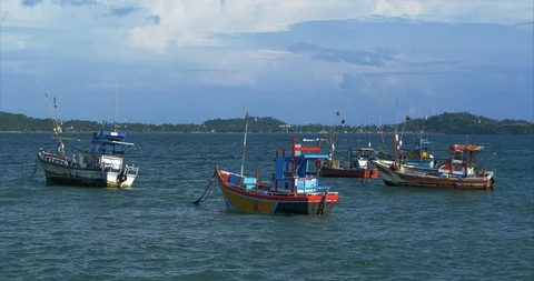Fishing boats swing on the waves. Stock Footage 125250817