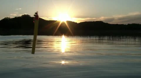 Fishing Bobber Dancing at Sunset Video stock 12580206