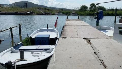Fishing bot at litte harbour Stock Footage 134298054