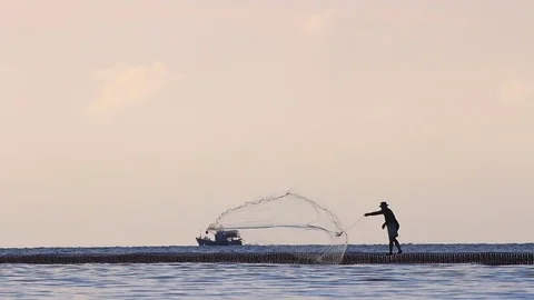 Fishing on bridge at sunrise. Stock Footage 70880405