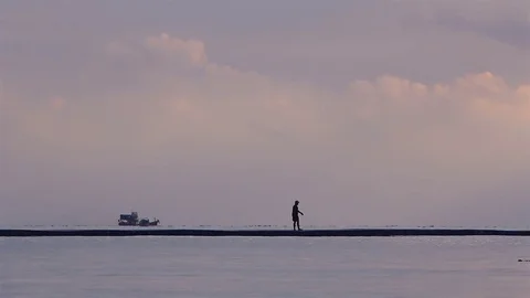 Fishing on bridge at sunrise. Stock Footage 70881607
