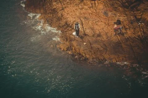 Fishing from the cliff. Stock Photos