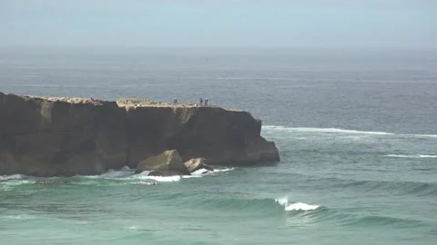 Fishing from the Cliffs at Vilanova de Milfontes Beach, Algarve, Portugal - 1770 Stock Footage 314892080