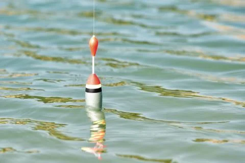 Fishing cork floating Stock Photos