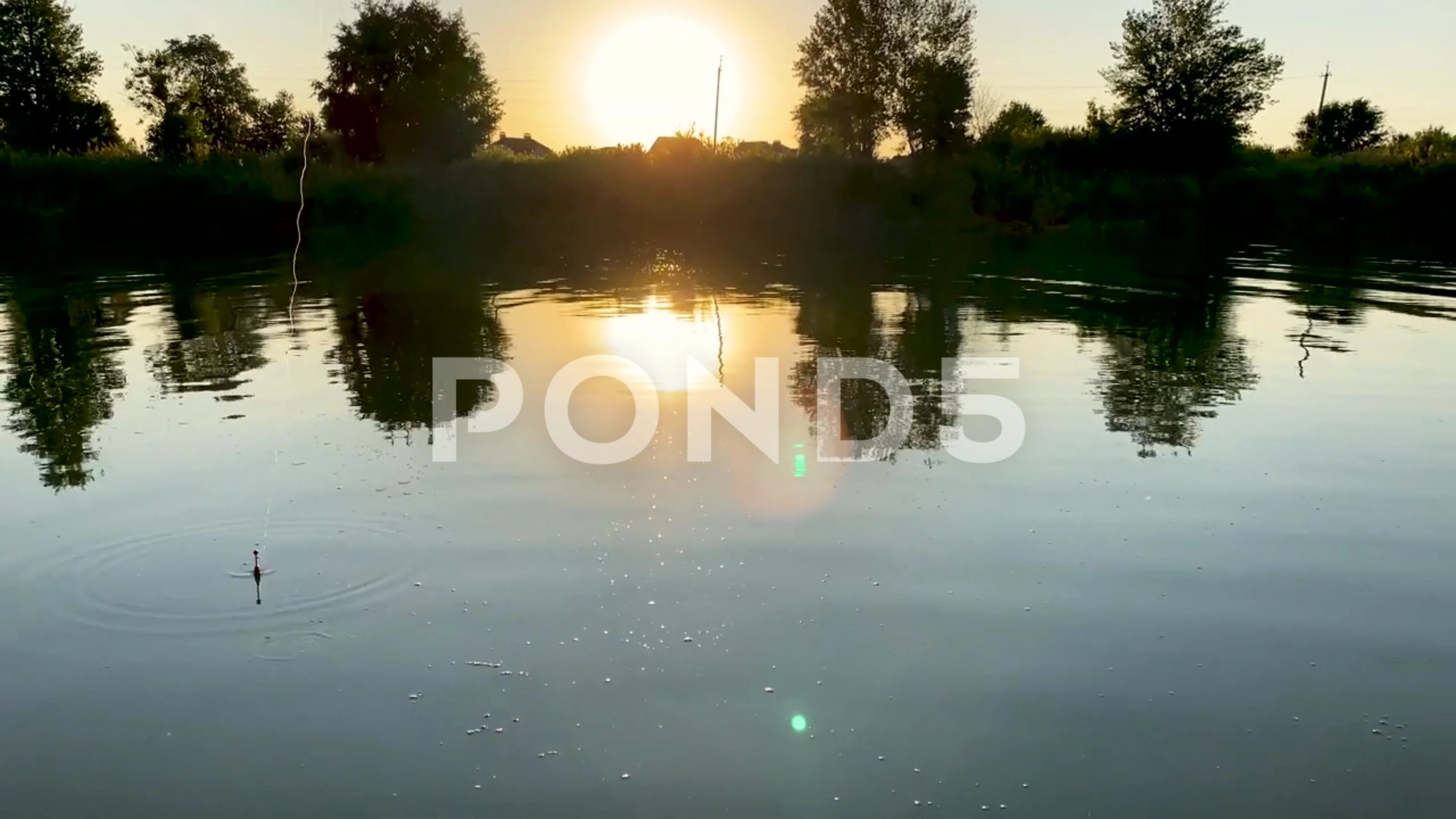 Fishing at dawn. Fisherman throws fishin, Stock Video