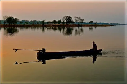 Fishing at dawn Stock Photos