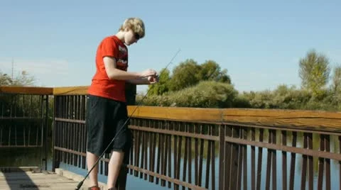 Fishing from the dock 库存影片 8949006