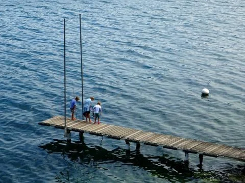 Fishing from the dock Stock Photos