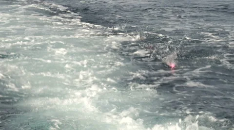 Fishing float pulled by fishing boat  Stock Footage 43323588