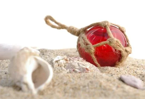 Fishing float in the sand Stock Photos