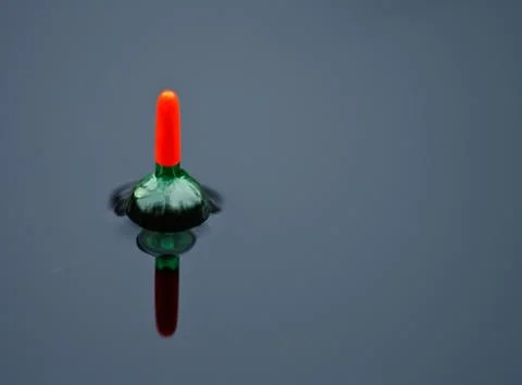 Fishing float still water Stock Photos