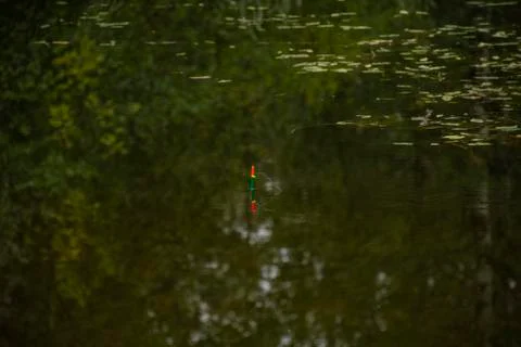 Fishing on a float on the water Stock-Fotos